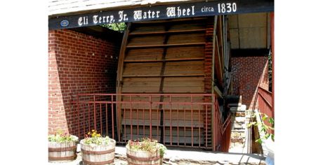 The Eli Terry Jr. Water Wheel (c.1830) in Terryville, a rare surviving wooden waterwheel once used to power a lock factory.